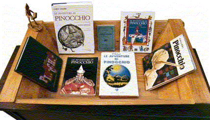 madia con libri di pinocchio in italiano